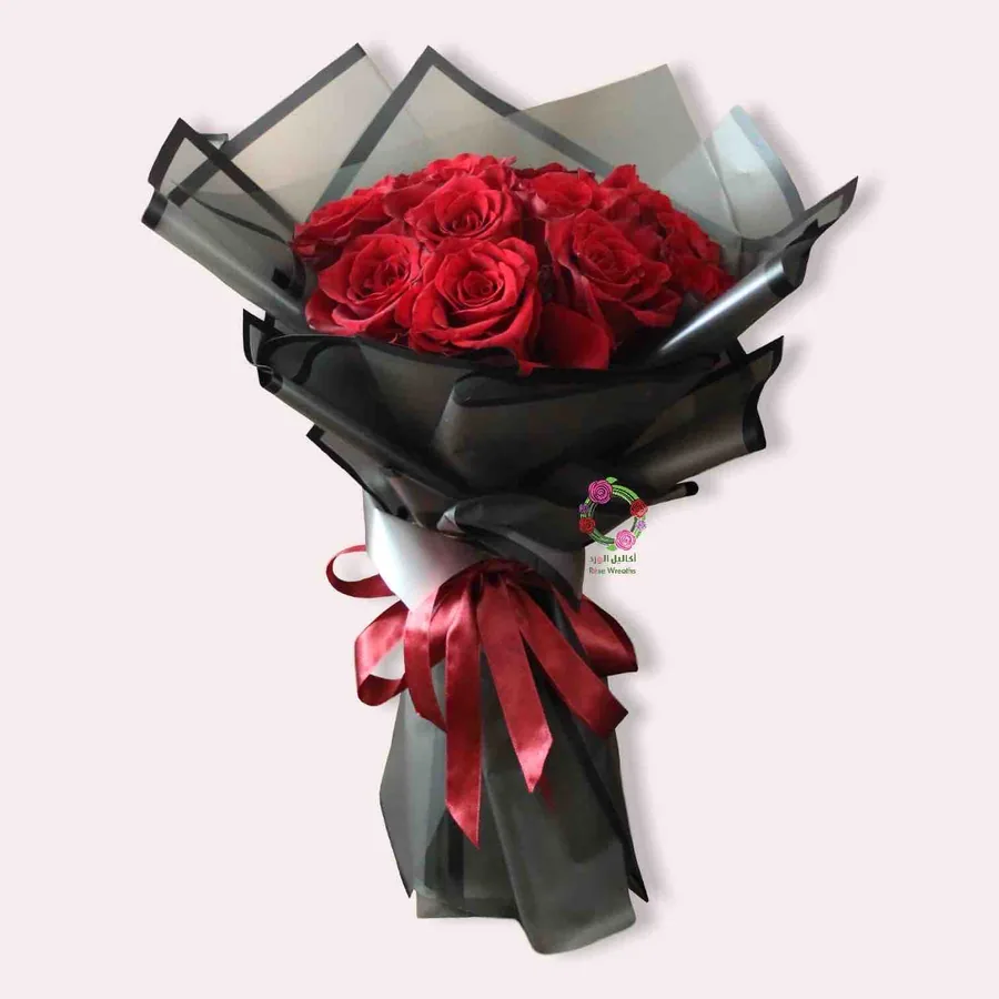 Red roses in black wrapping